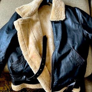 Vintage leather bomber jacket and belt. Wool lined interior.
